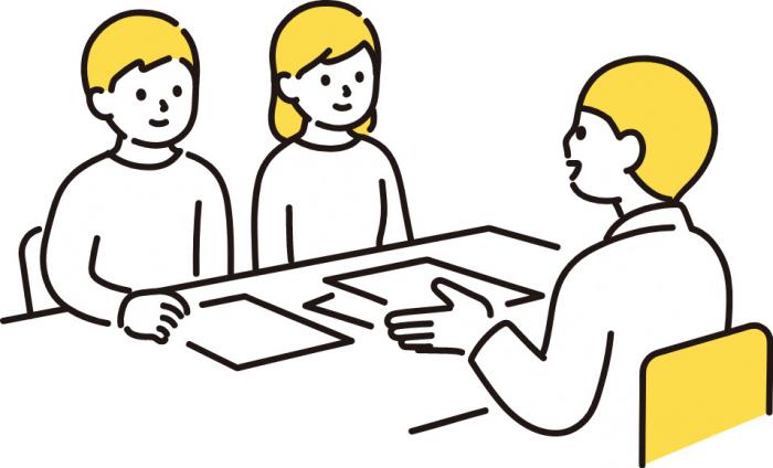 並んで座っている2人が対面に座っている人物と対話しているイラスト