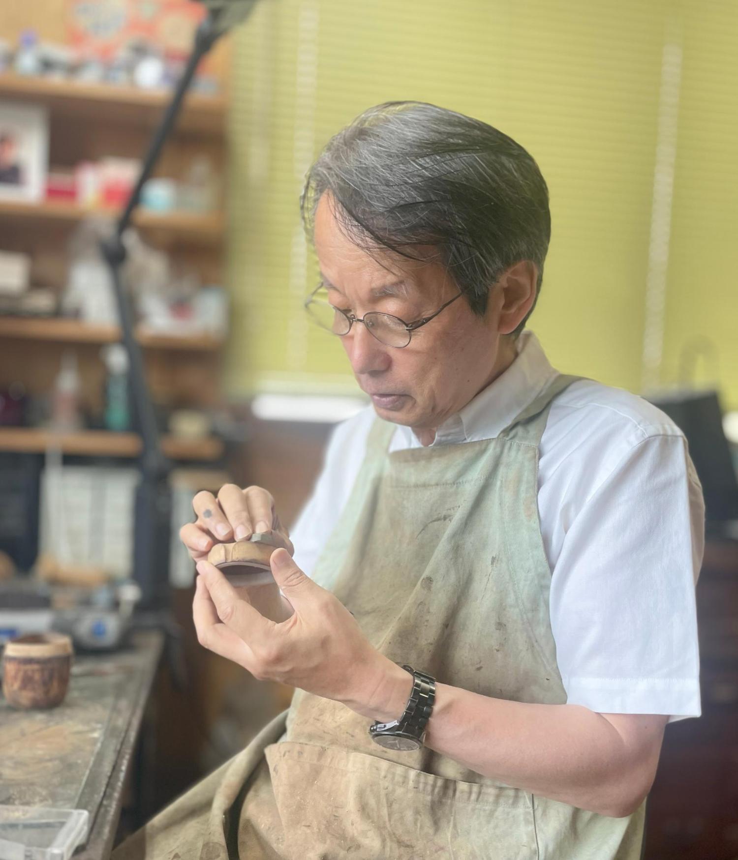 制作中の林曉氏