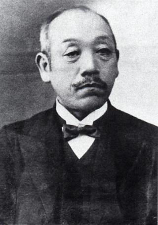 実業家・藤井能三の肖像写真